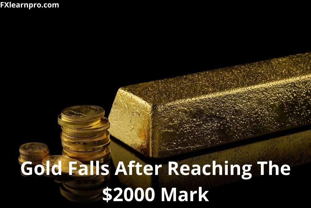 Gold falls after reaching the $2000 mark